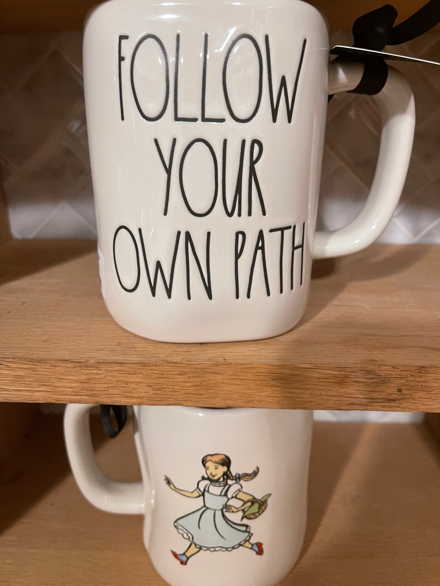 Rae Dunn Wizard of Oz Follow Your Own Path Cup with Image of Dorothy