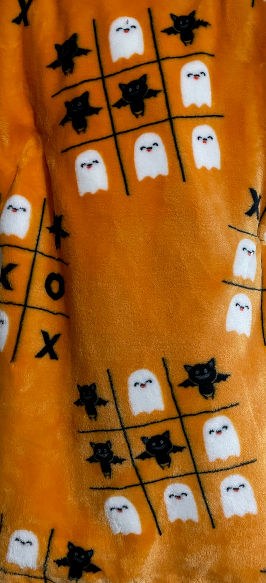 Trick or Treat orange tic tac toe throw