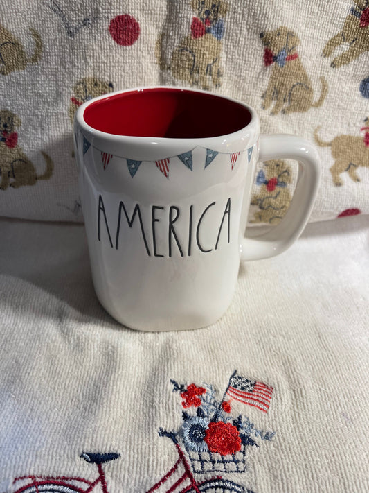 Rae Dunn America with Red Inside and Flag Banner around Top Rim of Mug