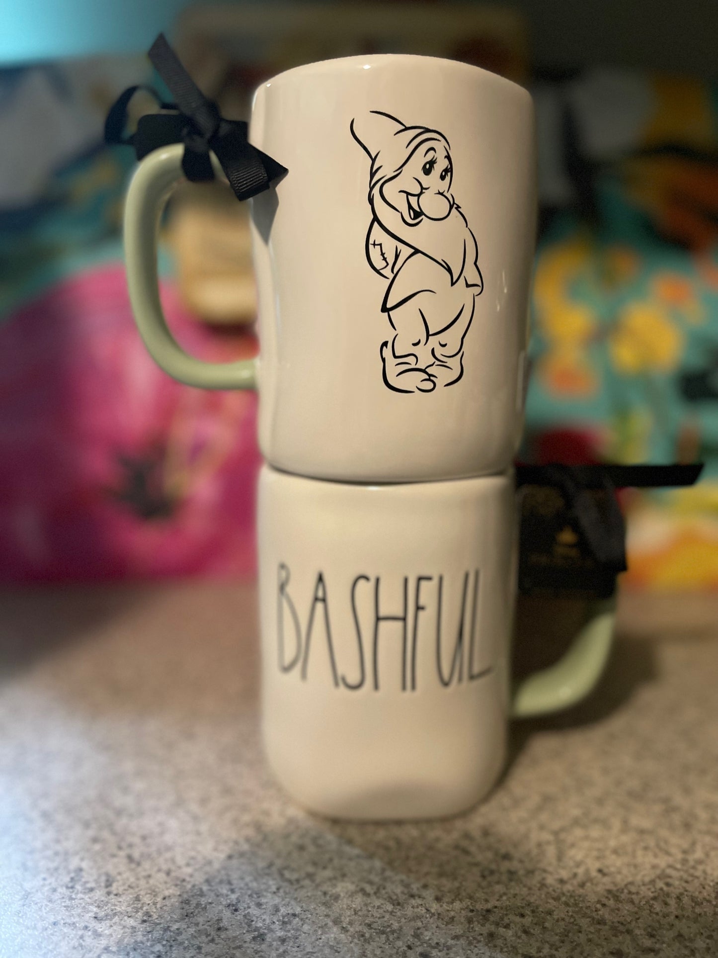 Rae Dunn Disney Bashful White Cup with Green Handle and Inside cup with Image of Bashful Dwarf on back of Cup