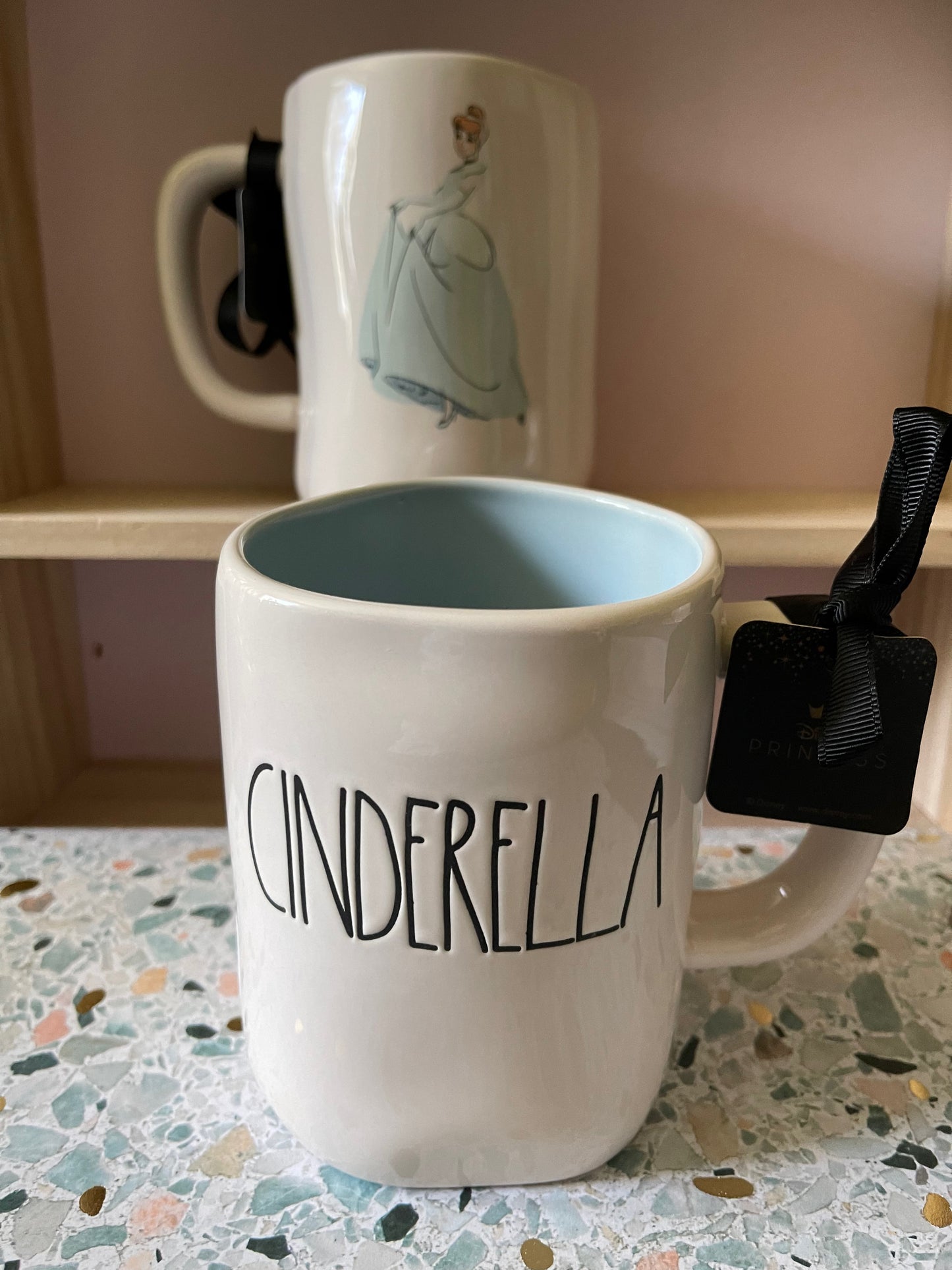 Rae Dunn Disney Cinderella White cup with Image of Cinderella on Back