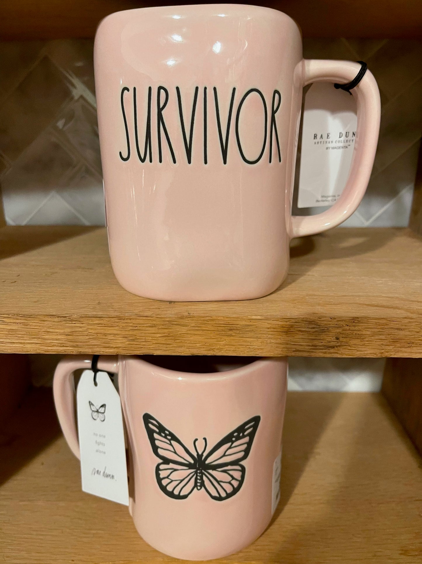 Rae Dunn Survivor Pink with Butterfly Image on Back and Black Lettering