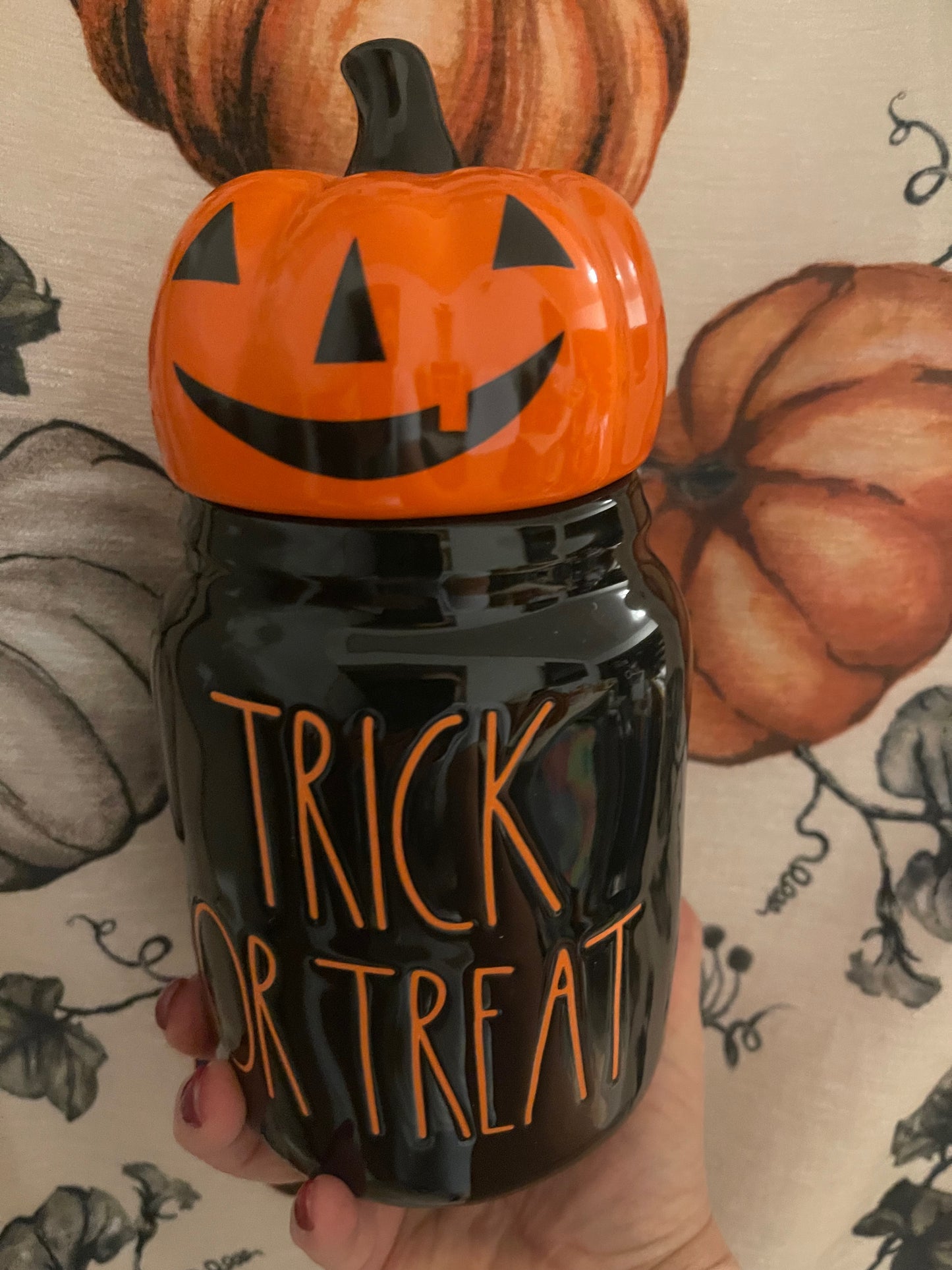 Rae Dunn Trick or Treat Black with Orange Pumpkin Head Small Canister and Orange Lettering