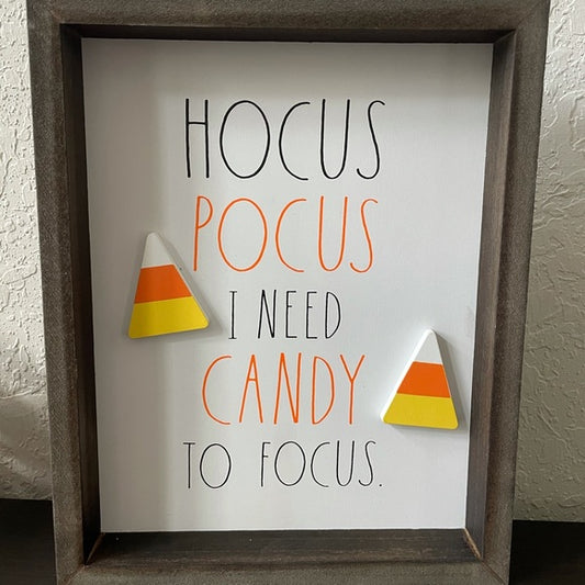 Rae Dunn Hocus Pocus I need Candy to Focus With Candy Corn, White Background and Black and Orange Lettering